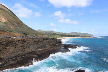 landscape with mountains, clouds, beaches, sky, and orange skies of beautiful Hawaii