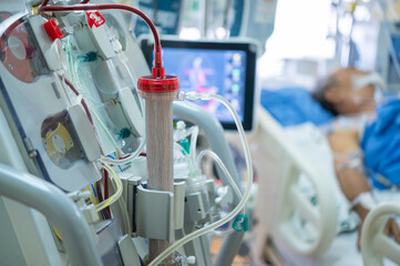 Experts are preparing a dialysis machine for use in critically ill patients in hospital intensive care units. - obrazy, fototapety, plakaty