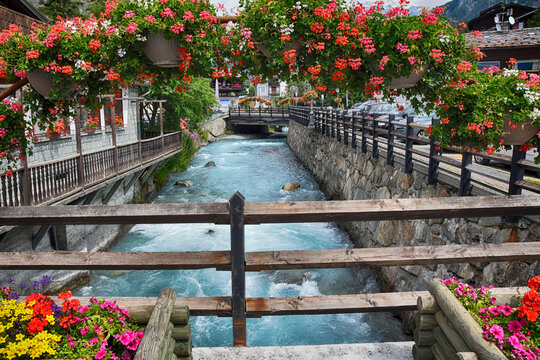 Flower decorations around village River Evancon, Champoluc, Monterosa, Aosta Valley, Italy