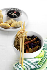 Lo mein with cabbage, zucchini, carrots and meat