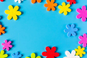 Naklejka na ściany i meble Flower eva foam rubber for decoration isolated on blue background, Decorative foam rubber material for creating artificial handmade flower, View from above.
