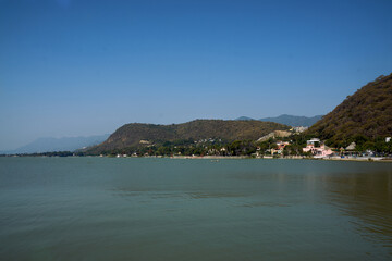 Fototapeta na wymiar Chapala, Jalisco, Mexico - April 24, 2023: Coastline of Chapala on Lake Chapala.