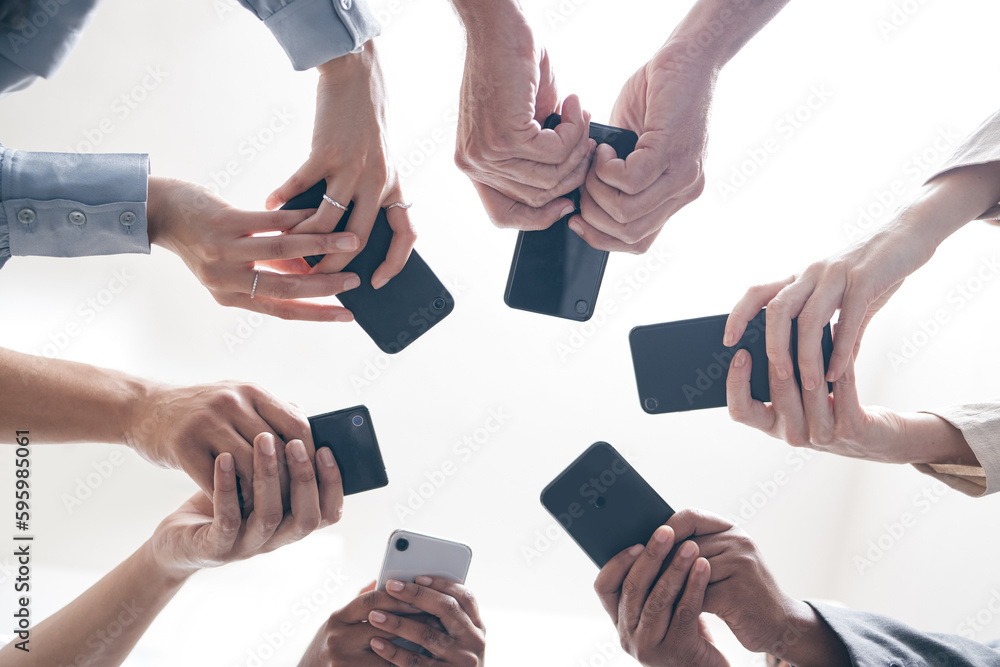 Aufkleber there is more power in unity than division. a group of businesspeople using their phones in synchron
