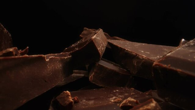 Broken dark chocolate bars. Macro lens.