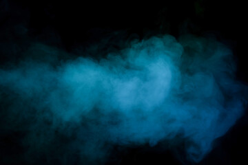 Blue and green steam on a black background.