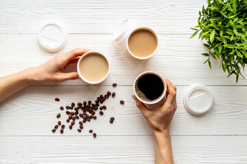 Obraz na płótnie Canvas Takeaway coffee in paper cups. Coffee to go concept