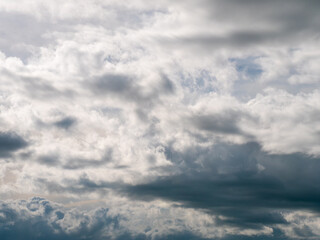 Gray clouds in the sky. Dramatic skies, landscape. The sky is like a background. White clouds and blue sky