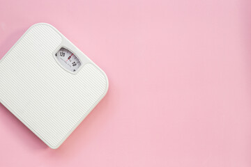 Weight control concept. White weight scales from above