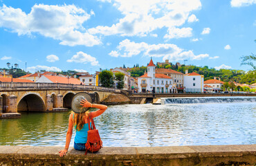 Woman tourist visiting city of Tomar in Portugal, Santarem