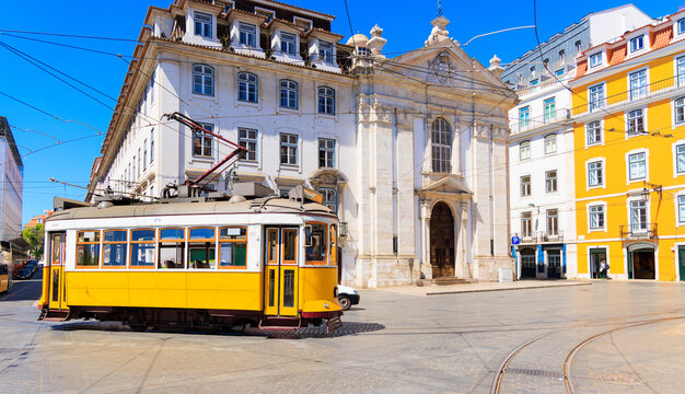 yellow tram in street of  Lisbon, Portugal, retro toned