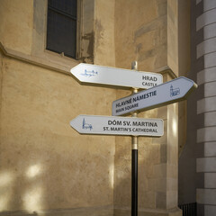 Signposts in the Old Town of Bratislava with important sights in Slovak and English language