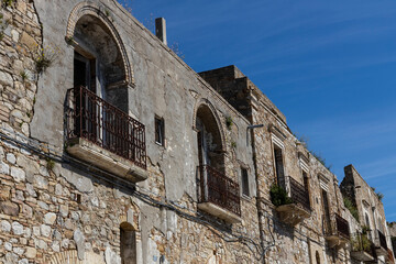 Craco, Basilicata. Abandoned city. A ghost town built on a hill and abandoned due to geological problems. Surreal look, horror film scenery. Panorama of the Calanchi Park.