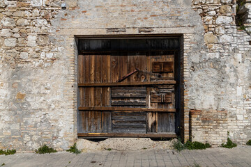 Craco, Basilicata. Abandoned city. A ghost town built on a hill and abandoned due to geological problems. Surreal look, horror film scenery. Panorama of the Calanchi Park.