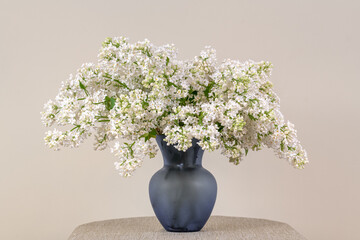 White lilac flowers in vase