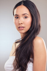 Fototapeta premium My hair is my crown. an attractive young woman posing alone in the studio.