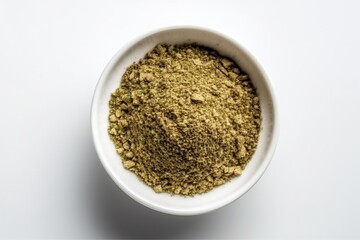 Dry oregano in white bowl. Ingredient for dishes, pizza, cuisine. Seasoning. 