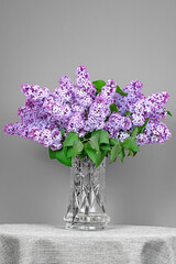 Violet lilacs in vase