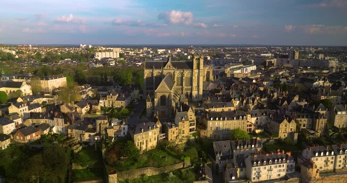 Flying over the famous city in France, which hosts 24 hour races. The most popular race track in the world. Le Mans cityscape in France.