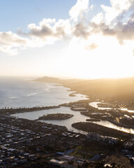 Sunset from top of Koko Head Crater. High quality photo. A railroad track hike up a mountain on Oahu, Hawaii.
