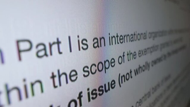 Tax form. Digital version of Certificate of Foreign Government on monitor screen scrolling in close-up