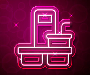 Glowing neon line Coffee cup to go icon isolated on red background. Vector