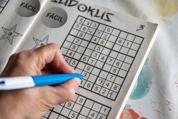 Mind exercise. Doing a Sudoku.