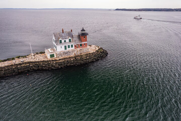 Aerial drone image of The Rockland Maine Breakwater Lighthouse at the entrance to Rockland Harbor...