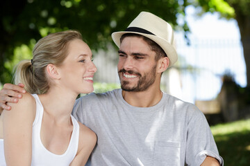 happy couple outdoors on a summers day