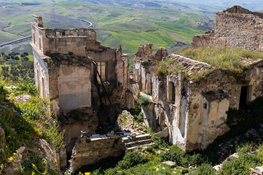 Craco, Basilicata. Abandoned city. A ghost town built on a hill and abandoned due to geological problems. Surreal look, horror film scenery. Panorama of the Calanchi Park.