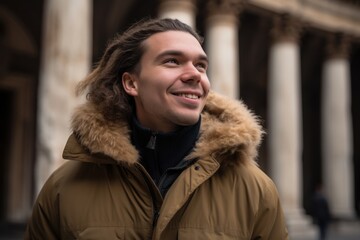 Environmental portrait photography of a grinning man in his 30s wearing a warm parka against a roman or ancient architecture background. Generative AI