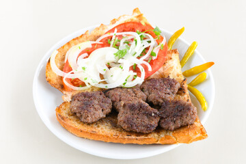 Meatball between bread (Turkish name : ekmek arasi kofte ). Izgara kofte
