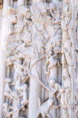 Marble details on facade of Messina Cathedral or Duomo di Messina, Sicily, Italy. Reliefs on wall...