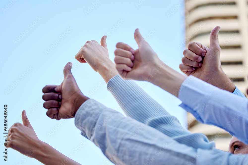 Poster your approval rating couldnt be higher. low angle shot of a group of unrecognizable businesspeople r