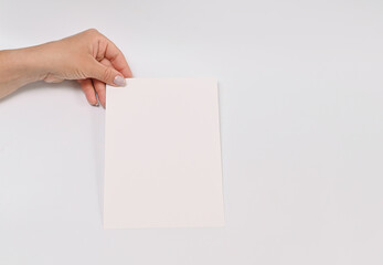 in the hand of a white sheet of paper in the hands of your advertising text