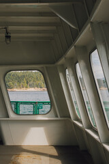 Obraz premium windows on Pacific Northwest ferry boat traveling through San Juan Islands