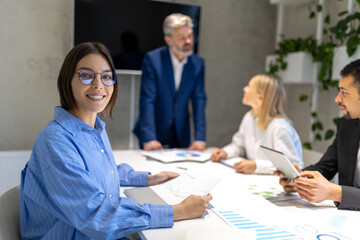 Business partners having negotiations and signing the contract