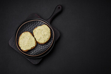 Grilled toast with avocado paste, eggs, cream cheese, salt, spices and herbs