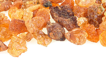 Pile of pure organic Frankincense Resin isolated on a white background. Myrrh resin. Natural Commiphora myrrha.