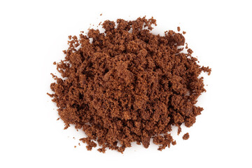 Dark muscovado sugar or Barbados sugar isolated on white background. Top view. Flat lay