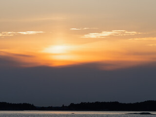Beautiful landscape on the sea. Very beautiful sunset rays reflected in the water. Ripples on the water.