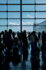 Silhouette of Passengers Waiting for Flight in Guarulhos International Airport. Sao Paulo, Brazil