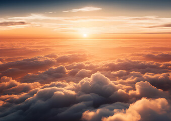 Naklejka premium Rising sun over clouds