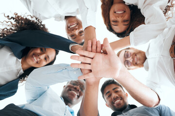 Are you ready for this. a group of businesspeople standing with their hands stacked in an office at work.