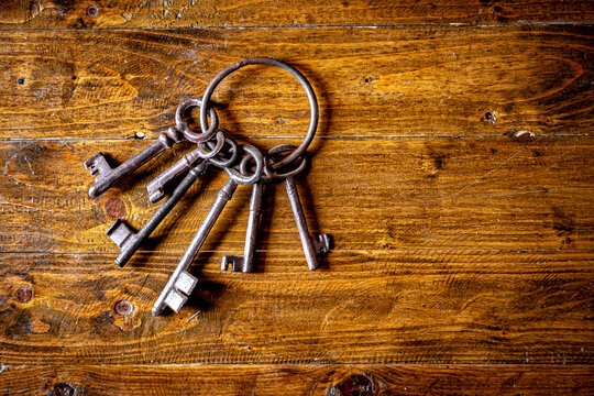 Ancient keys on wooden base