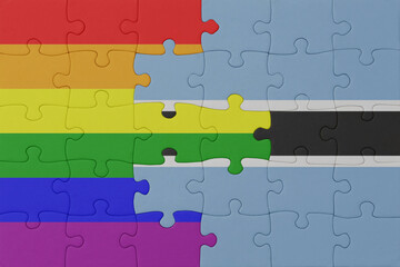 puzzle with the flag of rainbow gay pride and botswana . macro.concept.