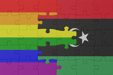 puzzle with the flag of rainbow gay pride and libya . macro.concept.