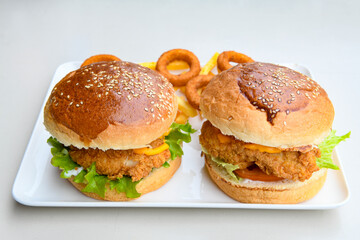 Big tasty burger with beef cutlet on a plate