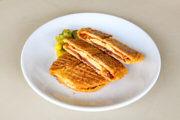 Turkish karisik atom Ayvalik tost ( kasarli bazlama tost) . Sucuklu, Kasarli, kavurmali karisik tost. Flat baked bread toasted