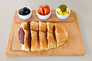 Turkish karisik atom Ayvalik tost ( kasarli bazlama tost) . Sucuklu, Kasarli, kavurmali karisik tost. Flat baked bread toasted