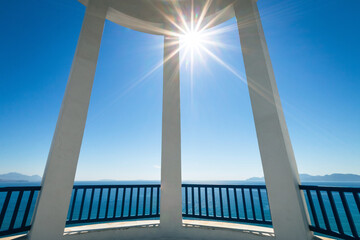 Scenic view of Mediterranean Sea and Greek islands seen through columns of a rotunda.